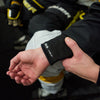 Youth Hockey Player Wearing Shock Doctor Protective Hockey Wrist Guard - Detail View of Back of Wrist Guard