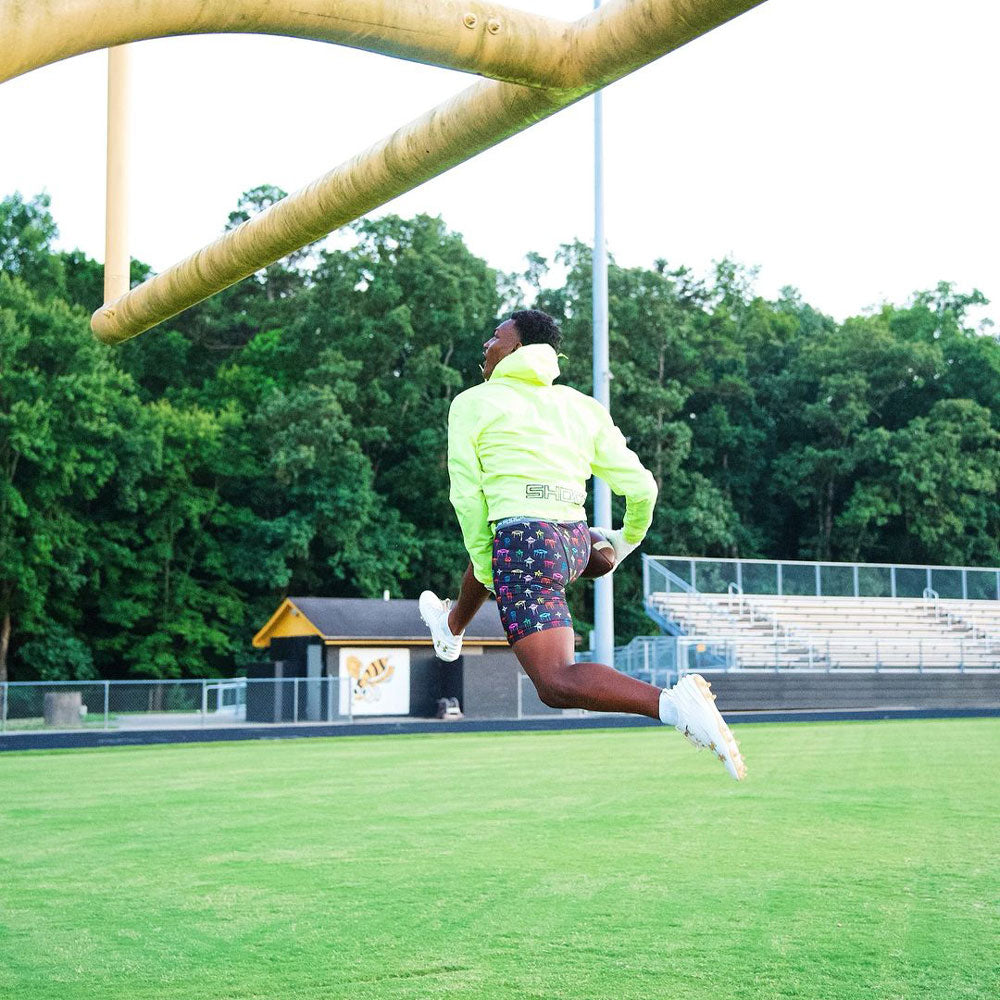 Youth Football Athlete Wearing Shock Doctor Multi Lux Core Compression Short with Cup Pocket