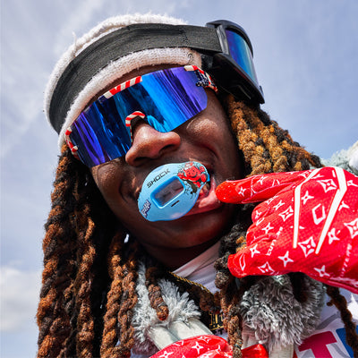 Youth 7v7 Football Player Wearing Shock Doctor Kool Aid Max AirFlow Football Mouthguard (Tropical Punch Flavor)