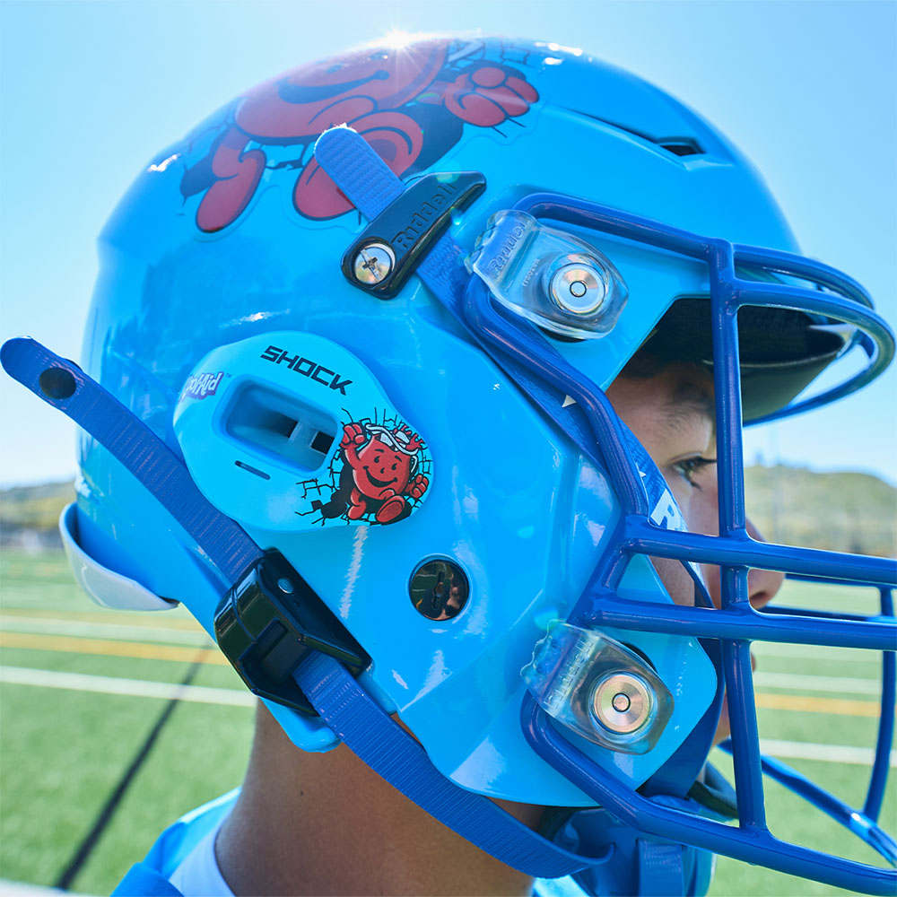 Youth Tackle Football Player Wearing Shock Doctor Kool Aid Max AirFlow Football Mouthguard (Tropical Punch Flavor)