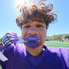 Youth Tackle Football Player Wearing Shock Doctor Kool Aid Max AirFlow Football Mouthguard (Grape Flavor)