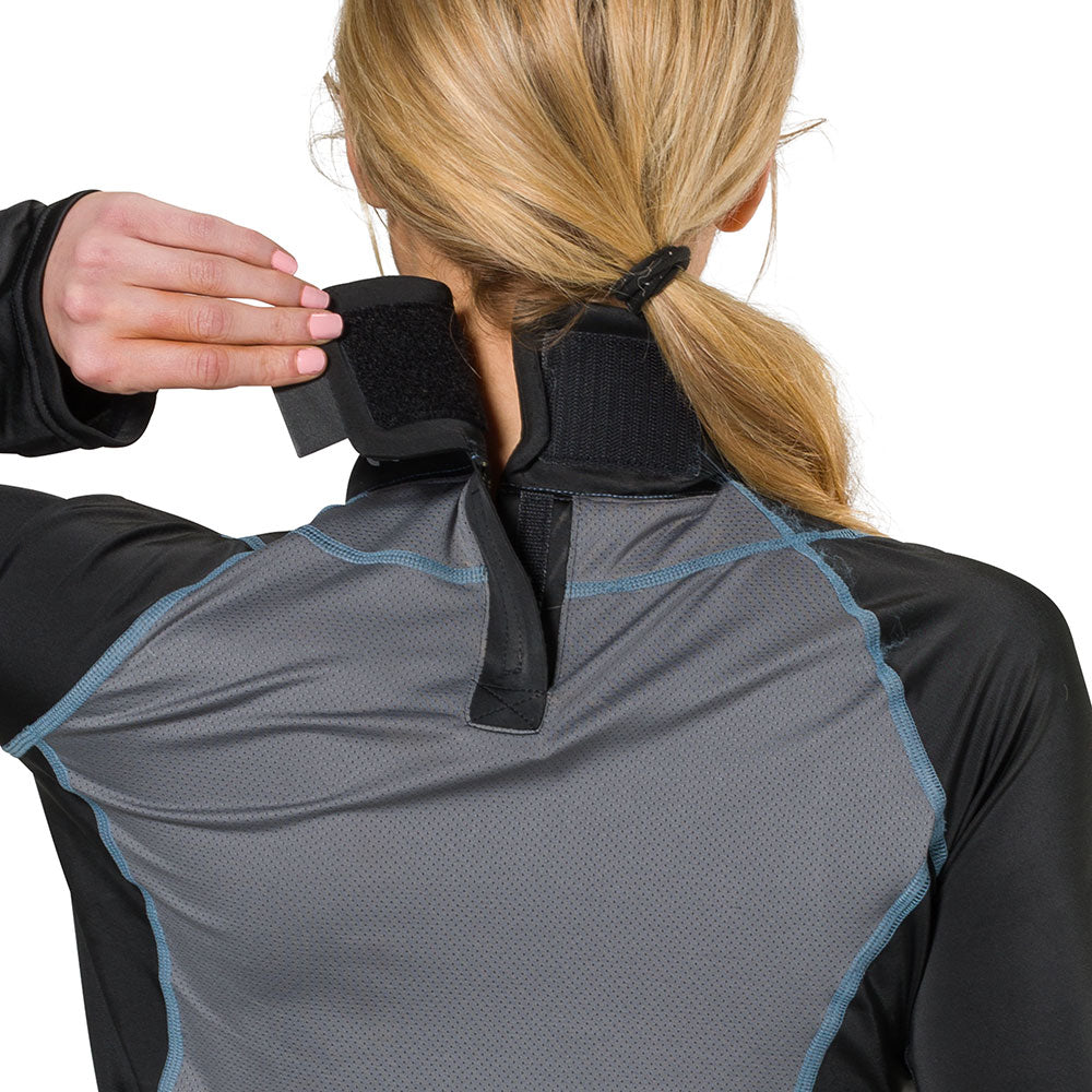 Shock Doctor Women's Ultra Compression Hockey Long Sleeve Shirt With Integrated Neck Guard - Black - On Model - Detail View of Back of Neck Guard on Female Hockey Player (Pulling Velcro Strap)