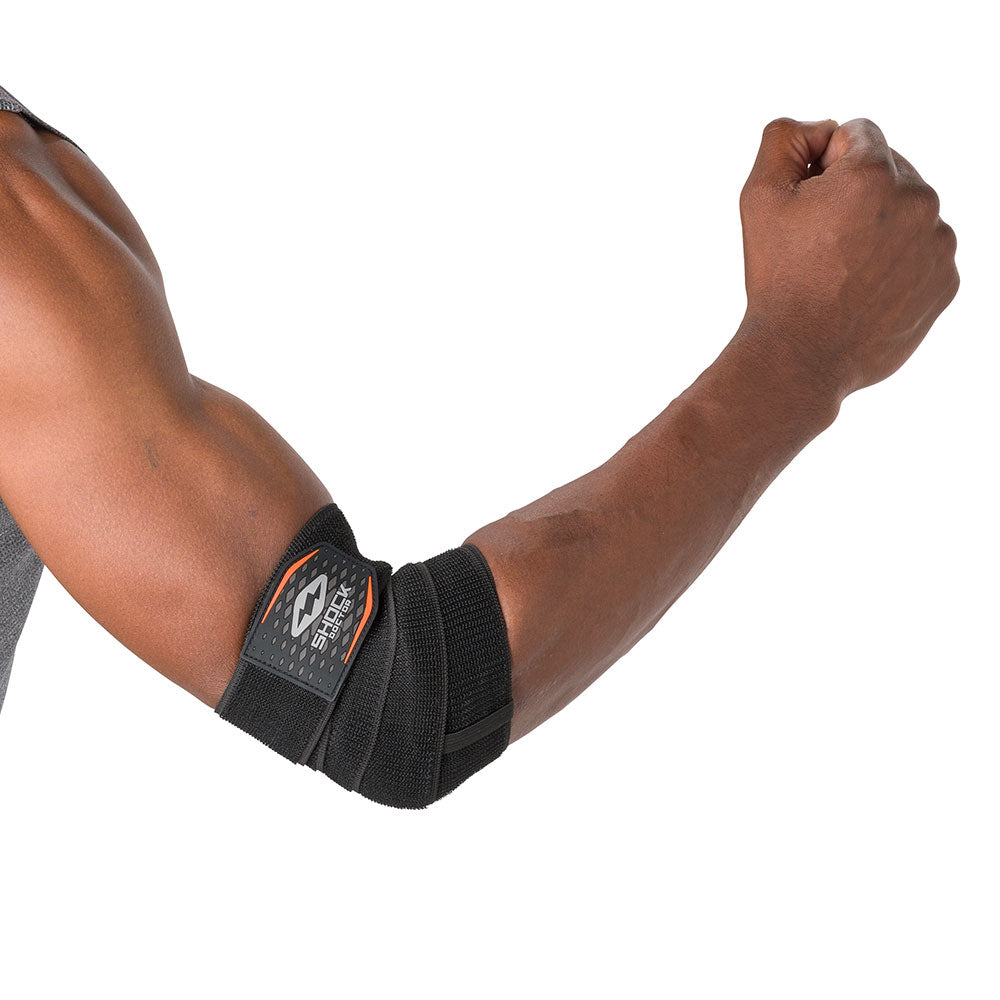 HyperWrap Multi-Use Compression Wrap by Shock Doctor shown in black, providing adjustable support for elbow with wrap-around design.