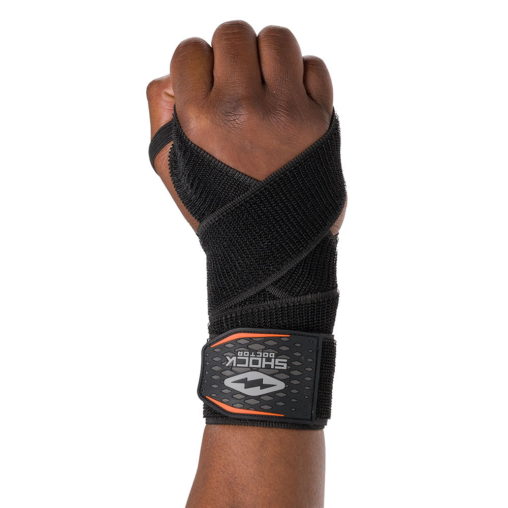 HyperWrap Multi-Use Compression Wrap by Shock Doctor shown in black, providing adjustable support for wrist with wrap-around design.