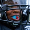 Youth Tackle Football Player Wearing Shock Doctor Kool Aid Gel Max Power Flavor Fusion Mouthguard