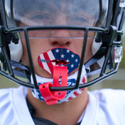 Youth Tackle Football Player Wearing Shock Doctor Stars and Stripes Bolt Lip Guard