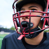Youth Tackle Football Player Wearing Shock Doctor 3D Stitch Max AirFlow Football Mouthguard (Black/Red)