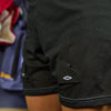 Lifestyle Image of Female Hockey Player Wearing Shock Doctor Women's Loose Hockey Short with Pelvic Protector - Detail View 2