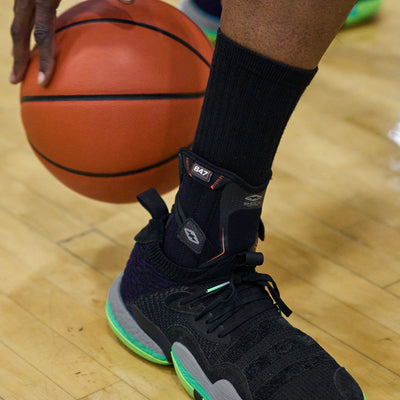 Basketball Athlete Wearing Shock Doctor Ankle Stabilizer